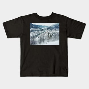 Wintertime - View on Snow-Covered Scandinavian Valley and Town Kids T-Shirt